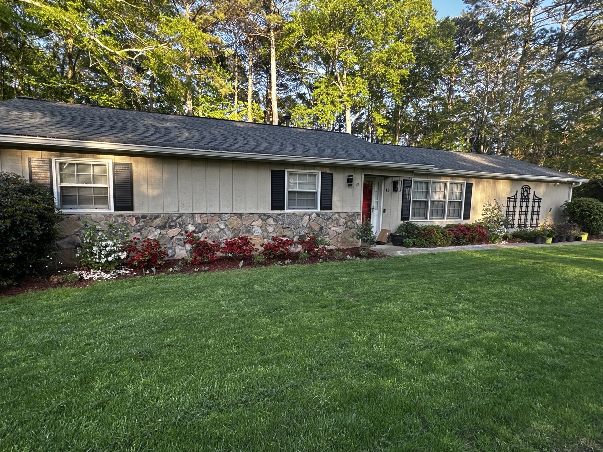 Manicured lawn with flowering beds
